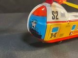 a toy helicopter that is sitting on a table