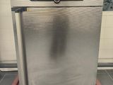 an image of a stainless steel dishwasher on a pallet