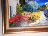 a picture of a painting hanging on the wall of a house