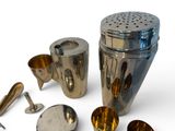 a lot of different metal items that are on the table