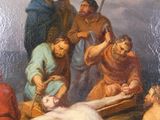 painting of jesus on the cross being nailed to a man on the cross