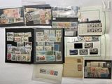 many different types of stamps on the table