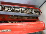 many tools in a red box on top of each other