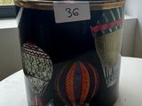 a black bucket with a picture of hot air balloons on it
