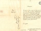 un vieux document sur lequel figure une lettre manuscrite au recto