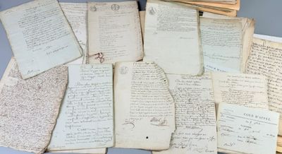 a pile of old papers sitting on top of a table