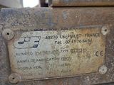 a metal plaque on the side of a building
