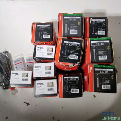 a pile of electronic equipment sitting on a table
