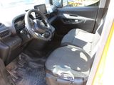 the interior of a truck with a steering wheel and dashboard