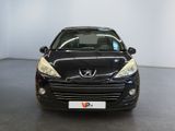 a picture of a black car parked in a showroom