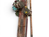 a pair of skis and a pair of ski poles next to each other