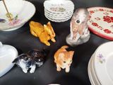 a lot of small figurines that are on a table