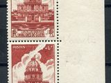 two stamps with a picture of a building on them