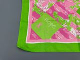 green and pink square scarf with pink and green design