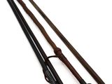 two old fashioned canes are sitting on a white surface