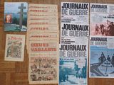 a lot of old french newspapers on the floor
