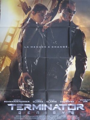 L'affiche du film « Terminator » est accrochée au mur.
