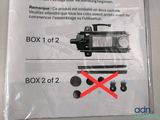a sign on the wall stating that the box is not in use