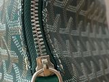 a close up of a purse with a zipper on it