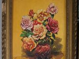 a painting of roses in a vase on a shelf