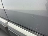 a close up of a car ' s door handle and the door handle is missing