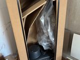 a cardboard box with a pair of shoes inside of it
