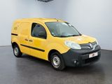 yellow van parked in a white room with a black floor