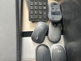 a lot of computer equipment sitting on a desk