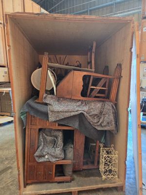 a cardboard box with a lot of furniture inside of it