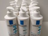 four bottles of lotion lotion lotion lotion lotion lotion lotion lotion lotion lotion lotion lotion lotion lotion lot