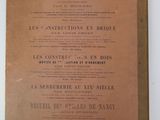 an old book on a white table with a brown cover