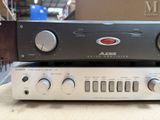 an image of a close up of a stereo system on top of a table
