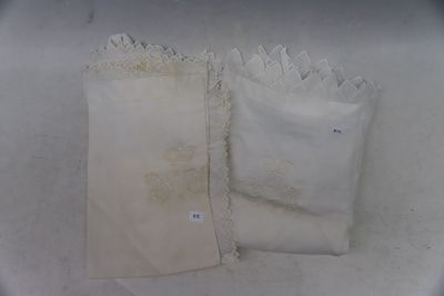 two bags of flour sitting on a white surface
