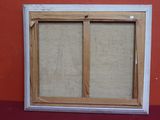 a picture of a picture of a window on a red wall