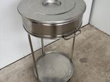 an image of a stainless steel table with a lid on it