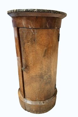 an old wooden barrel with a marble top on a white background