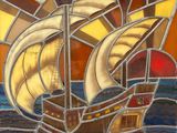a stained glass picture of a ship in the water