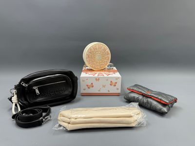 the contents of a travel bag are laid out on the table