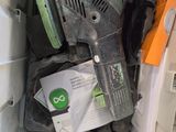 a box with a sander and other items inside of it