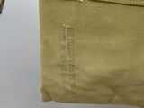 a close up of a pair of pants hanging on a clothes line
