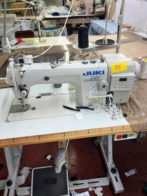 a sewing machine that is sitting on a table