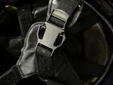 a close up of a helmet with a buckle on it