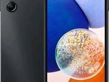a black samsung m29 smartphone with a picture of a colorful ball on the screen