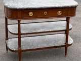 une photo d'une table d'appoint avec un plateau en marbre et trois étagères