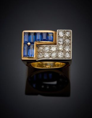 a yellow gold ring with blue sapphires and diamonds