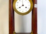 a clock that is sitting on top of a table