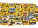 a lot of toy cars that are stacked up together