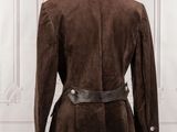 the back of a brown sued jacket on a mannequin mannequin mannequin mannequin mannequin mannequin mannequin manne