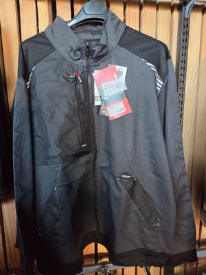 jacket hanging on a rack in a clothing store with tags on it