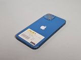 an apple iphone is sitting on a table with a price tag attached to it